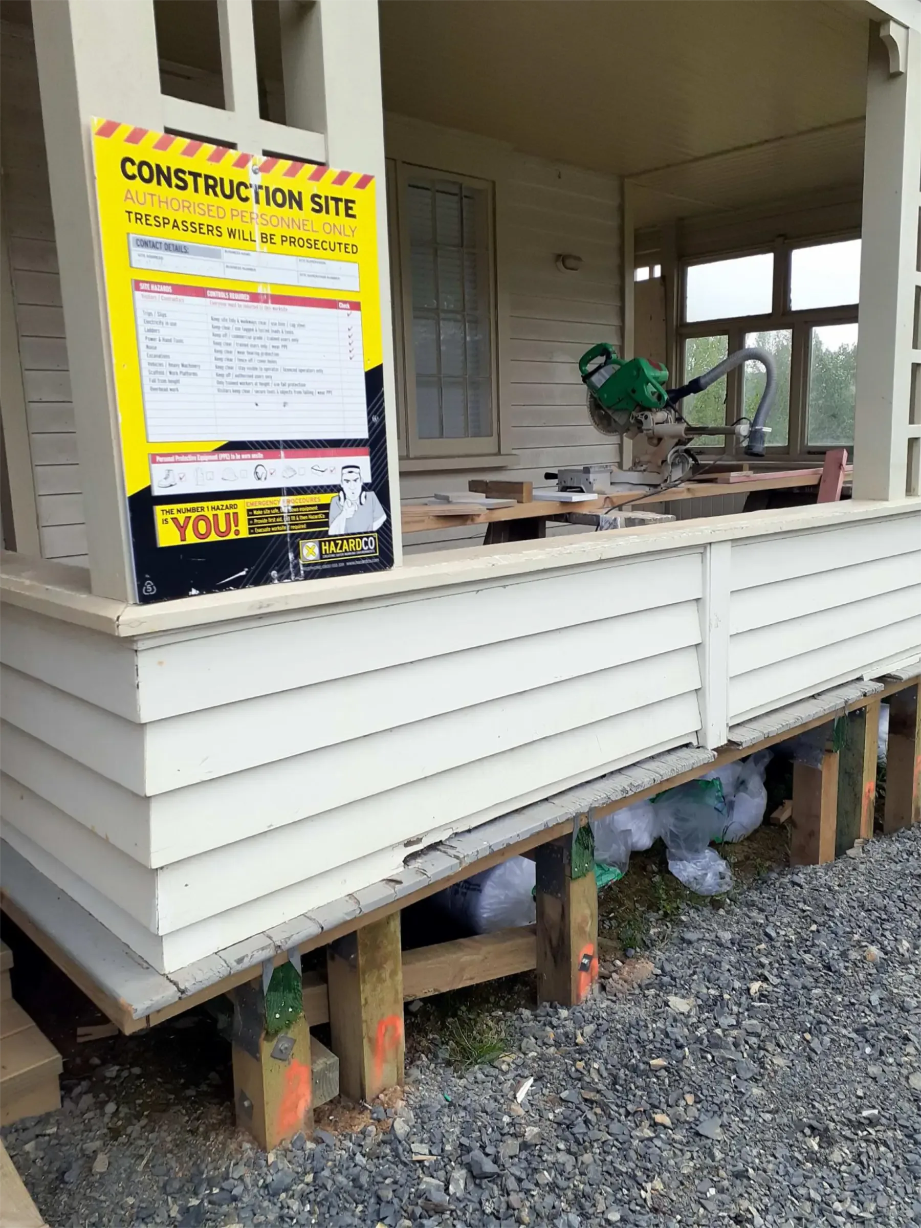 Construction site sign on the verandah